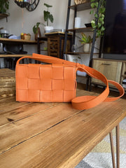 Bottega Veneta orange leather Cassette crossbody small bag