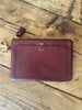 Anya Hindmarch burgundy leather coin purse