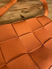 Bottega Veneta orange leather Cassette crossbody small bag