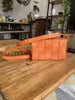 Bottega Veneta orange leather Cassette crossbody small bag